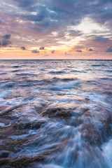 Obraz premium Long exposure sea and rocks at twilight