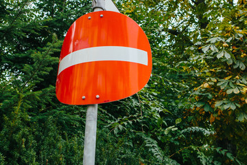 road sign ban on street, sign folded corners, Europe