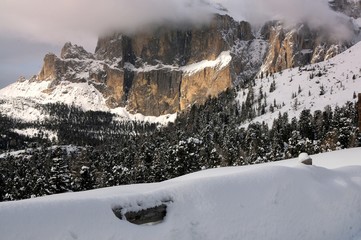 the Sella Group with snow in the Italian Dolomites, Italy.