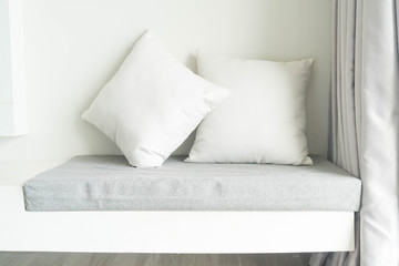 Fototapeta na wymiar Beautiful pillow on sofa decoration in living room