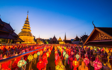 Background lamp lantern festival Wat Phra That Hariphunchai. © PhotoJuthamat