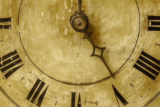 Close up of an ancient weathered clock