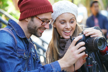 Photographer taking picture of girl in NYC streets