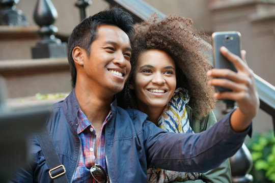 Mixed-race Couple Taking Selfie Picture