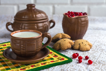 The milk in pottery and biscuits, breakfast