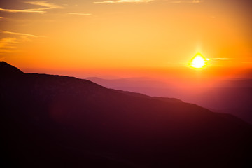 A beautiful view of the sunset in mountains