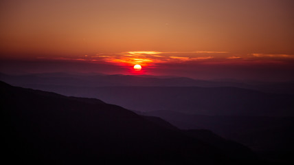 A beautiful view of the sunset in mountains