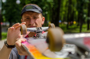 Young man with the skateboard 