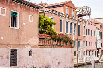 Venice old town street with flowers