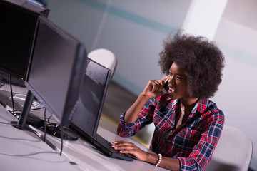 young black woman at her workplace in modern office
