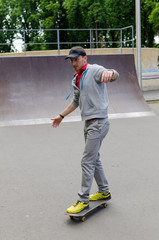 Young man with the skateboard