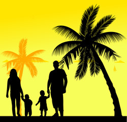 Family walking with their children on the beach, one in the series of similar images silhouette