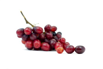 bunch of small red grapes isolate on white background