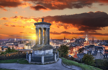 Edinburgh against sunset with Calton Hill in Scotland - 126128240