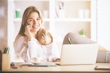 Gorgeous businesslady talking on phone