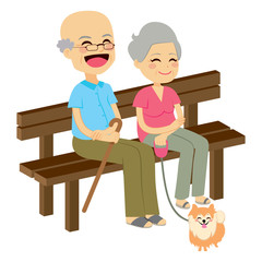 Cute senior couple sitting on wooden bench with dog resting