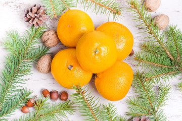 Christmas composition with tangerines and spices. Christmas Card. New Year holiday decoration