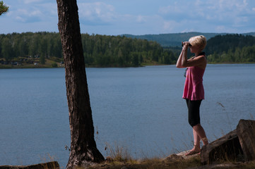 Girl with binoculars