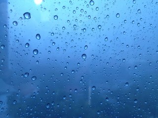 blue rain water drop on mirror, lonely rain day