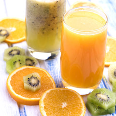 Fresh orange and kiwi  juice in glass 