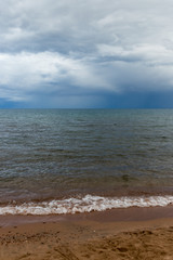 Fototapeta na wymiar cloudy weather on the sea as background