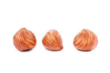 Group healty hazelnuts isolated on white background