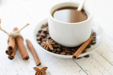Mug coffee and coffee beans and spices.