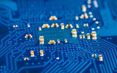 blue circuit board background of computer motherboard