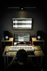 sound engineer, producer working in digital editing studio for tv, broadcasting, music production background
