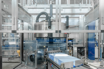 for the production of plastic bottles and bottles on a conveyor belt factory