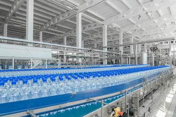 for the production of plastic bottles and bottles on a conveyor belt factory