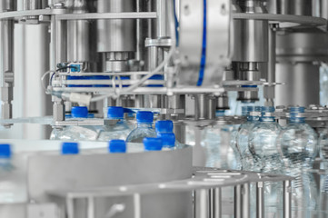 for the production of plastic bottles and bottles on a conveyor belt factory