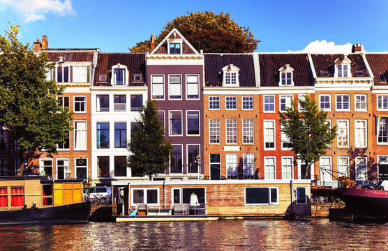Outdoor view of the traditional old dutch houses in Amsterdam, the Netherlands