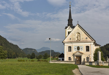 Traditional catholic church in Bohinjska Bela village near Bled, Slovenia.