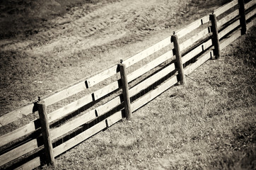 Diagonal sepia farm wooden fence background