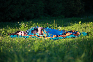 Beautiful gypsy girl in a traditional dance in the woods