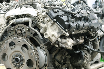 Car engine under repair in a car repair station