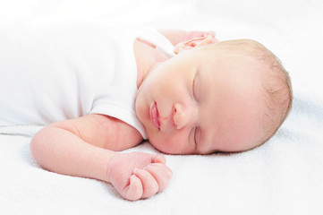 New baby sleeping on blanket