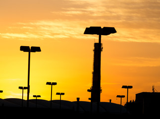 Obraz premium light poles at sunset