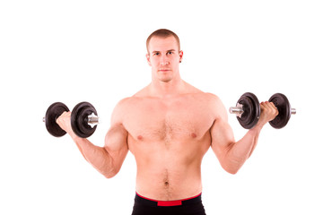 Fototapeta na wymiar Muscular guy doing exercises with dumbbells over white background