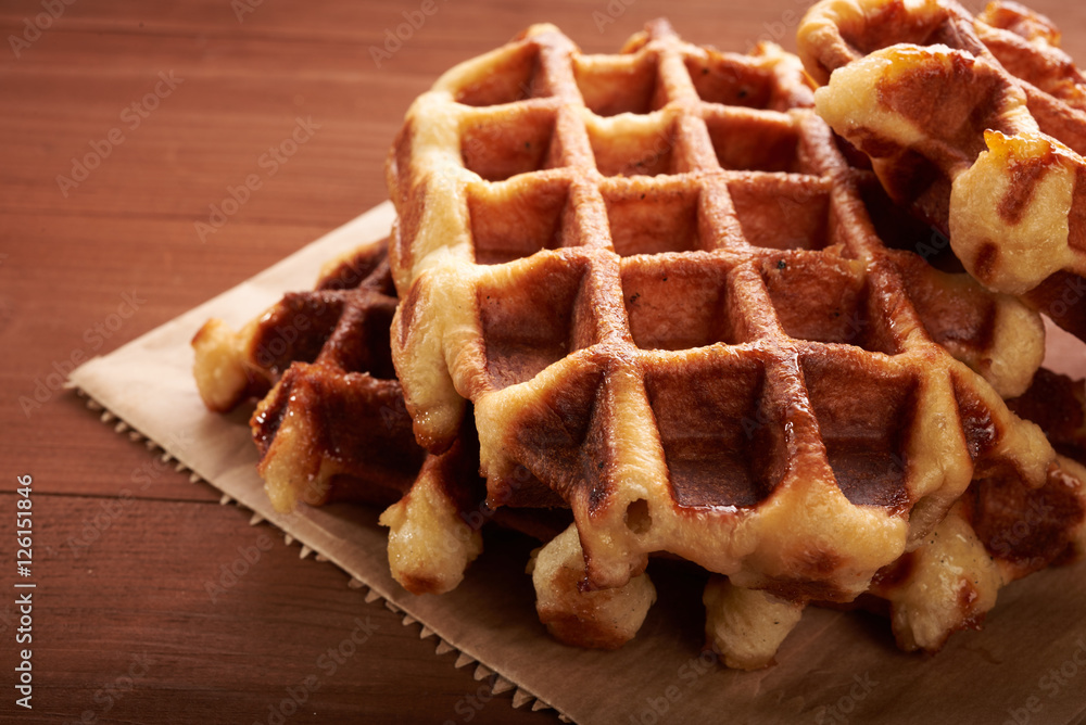 Wall mural Belgian waffles on a wooden table