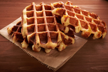 Belgian waffles on a wooden table