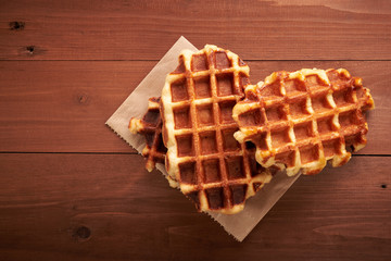 Belgian waffles on a wooden table