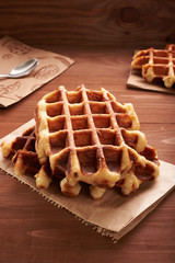 Belgian waffles on a wooden table