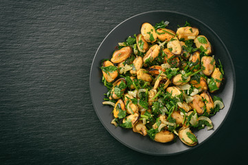 Mussels cooked with parsley, garlic and wine.