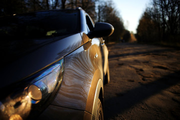 Naklejka premium car autumn road, sun, concept autotravel