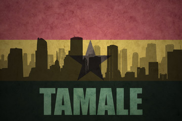 abstract silhouette of the city with text Tamale at the vintage ghanaian flag