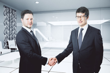 Fototapeta premium Businesspeople shaking hands