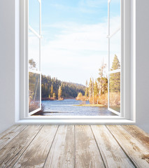 Window with autumn landscape view