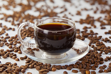 coffee in coffee cup with natural grains
